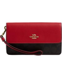 COACH - Foldover Wristlet - Lyst