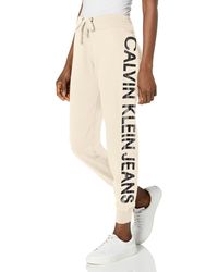 Calvin Klein - Cozy Fleece Jogger mit Logo Trainingshose - Lyst