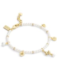 COACH - Jewelry Signature Cat Charm Pearl Strand Bracelet - Lyst