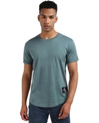 Calvin Klein - Calvin Klein Badge Short Turn Up Sleeve Round Neck T-shirt - Lyst