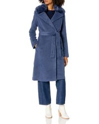 Women's Guess Fur coats from $177 | Lyst