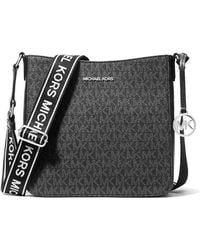 Michael Kors - Borsa a tracolla da donna Jet Set da viaggio piccola con logo firmato - Lyst