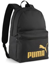 PUMA - Phase Rugzak Voor Goud/Zwart - Lyst