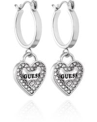 Guess - Silvertone Logo Heart Dangle Charm Hoop Earrings - Lyst