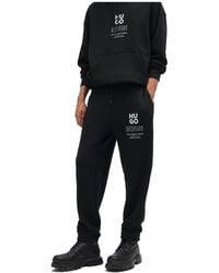 HUGO - Relaxed-Fit Jogginghose Mit Logo Und Slogans - Lyst