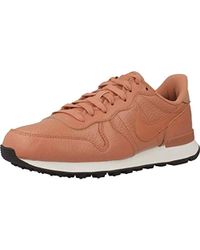 nike blush internationalist suede trainers