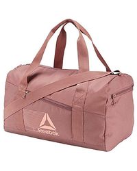 bolso reebok amarillo