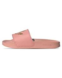 Chanclas de dedo y de pala adidas de mujer: hasta el 40 % de descuento |  Lyst