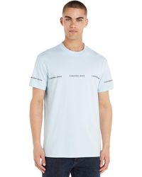 Calvin Klein - T-Shirt Kurzarm Logo Repeat Tee Rundhalsausschnitt - Lyst