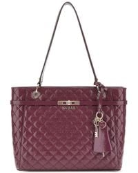 Guess - Sac à épaule Idra Noel Tote Bag Wine framboise - Lyst