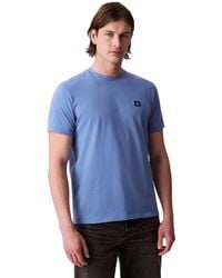 Calvin Klein - Uomo T-Shirt iche Corte Badge Jersey Classic Tee in Cotone - Lyst