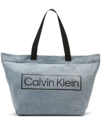 Calvin Klein Monogram Mini Tote SKU: 9449009 