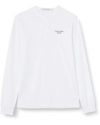 Calvin Klein - Maglietta Henley LS con Logo impilato L/S Maglia Top - Lyst