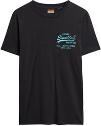 Superdry - Locker geschnittenes T-Shirt mit Tattoo-Grafik Schwarz XXXL - Lyst