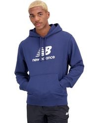 New Balance - T-Shirt NB Essentials Stacked Logo Fleece Hoodie - Lyst