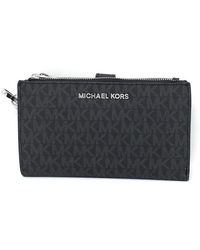 Michael Kors - Jet Set Travel Leather Logo Large Double Zip Wristlet Wallet (black) - Lyst