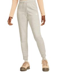 Nike - Broek Mid-rise Slim Grijs Code Dq5174-063 - Lyst