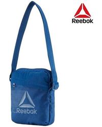 bolso reebok hombre amarillo