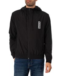 HUGO - Benjoe2341 Wasserabweisende Jacke mit Kapuze und vertikalem Logo Schwarz L - Lyst