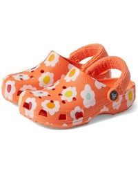 Crocs™ - Zoccolo classico unisex con grafica e cinturino posteriore in spugna - Lyst