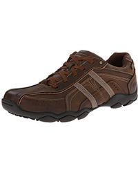 skechers lace up hombre marron