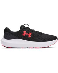 Under Armour - Sneaker Charged Surge 4 da uomo, - Lyst