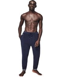 red lacoste tracksuit bottoms