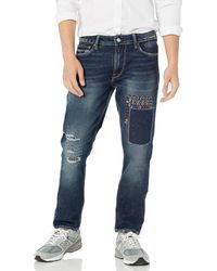 Guess - Slim Tapered Denim Jeans - Lyst