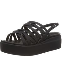 Crocs™ Brooklyn Strappy Low Wedge Sandals in Black | Lyst UK