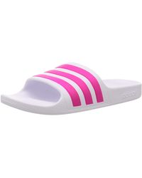 Chanclas de dedo y de pala adidas de mujer: hasta el 40 % de descuento |  Lyst