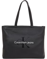 Calvin Klein - Jeans Donna Borsa Tote Bag Sculpted Slim Grande con Zip - Lyst