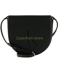 Calvin Klein - Jeans Bolso con Bandolera para Mujer Sculpted Mini Saddle Bag Pequeño - Lyst