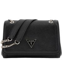Guess - Noelle Covertible Xbody Flap Bag Black - Lyst
