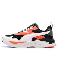 PUMA - Scarpe da ginnastica nere/bianche/arancioni ragazzo X-Ray - Lyst