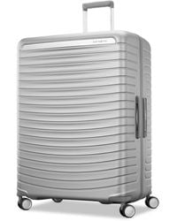 Samsonite - Valise Rigide Framelock e à roulettes pivotantes - Lyst