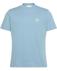 Calvin Klein - Uomo T-Shirt iche Corte Badge Jersey Classic Tee in Cotone - Lyst