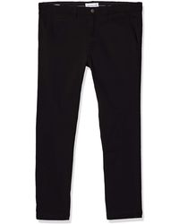 Pantalones, pantalones de vestir y chinos Calvin Klein de hombre: hasta el  68 % de descuento | Lyst