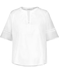 Gerry Weber - Tunika mit Zierdetails GOTS halber Arm Bluse Kurzarm Halbarmbluse unifarben Off-White 48 - Lyst