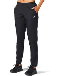 Asics - 2012C339-001 Core Woven Pant Pantaloni Sportivi Donna Performance Black Taglia XL - Lyst