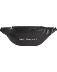 Calvin Klein - Jeans Sac Banane Monogram Soft Petit - Lyst