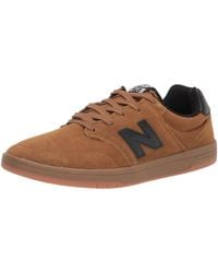 new balance 620 marrone