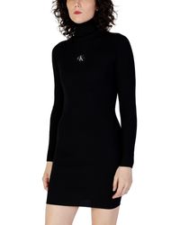 Calvin Klein - Jeans Badge Roll Neck Sweater Dress J20J221690 Vestidos de Punto - Lyst