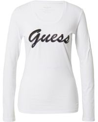 Guess - T-Shirt Girocollo ica Lunga Logo in Strass Donna Bianco W3RI15J1314-G011-L - Lyst