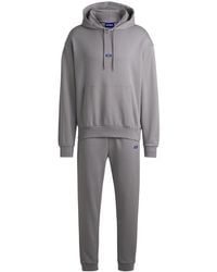 HUGO - Trainingsanzug-Set Aus Baumwoll-Terry Mit Blauen Logo-Aufnähern - Lyst