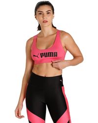 PUMA - Mid Impact Fit Bra Underwear Top - Lyst