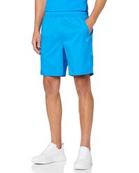 CARE OF by PUMA Shorts - Blue