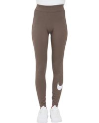 Nike - Sportswear Essential Leggings mit mittelhohem Bündchen und Swoosh - Lyst