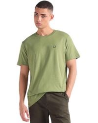 Calvin Klein - Jeans T-shirt iche Corte Uomo Ck Embro Badge Scollo Rotondo - Lyst