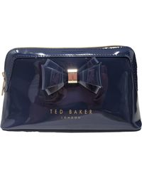 Ted Baker - Aimee Curve Bow Make Up Bag In Navy - Lyst