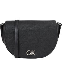 Calvin Klein - 's Crossbody Saddle Bag With Turn Lock Fastening - Lyst